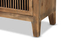 Aiden Rustic Medium Oak Finished 2-Door Wood Spindle Accent Storage Cabinet Baxton