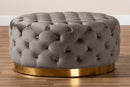 Arielle Gray Velvet Fabric Upholstered Gold Finished Round Cocktail Ottoman Baxton