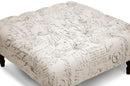 Delaire Beige Script Print Modern Tufted Ottoman Baxton