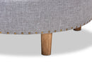 Variel Light Gray Fabric Upholstered Natural Wood Cocktail Ottoman Baxton