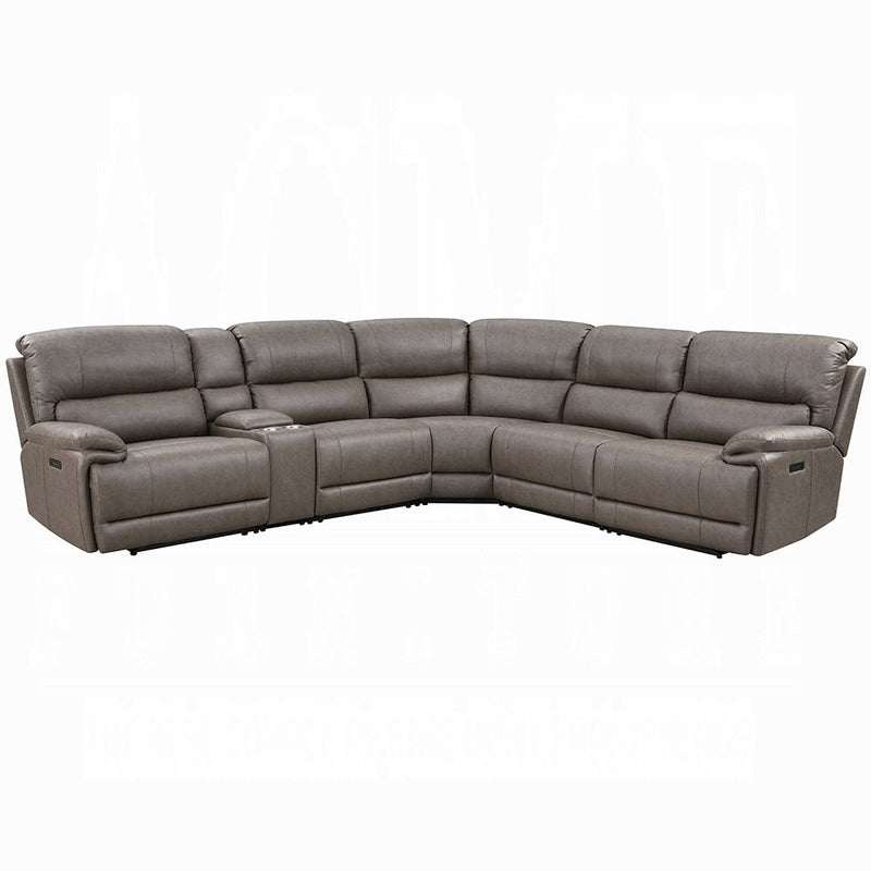 Modern living room with a sectional sofa, styled with minimalist décor in 2025.