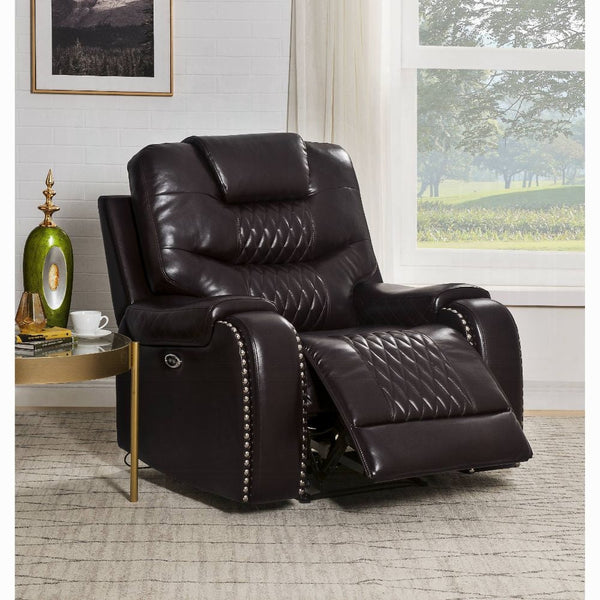 Luxury leather recliner chair with padded cushions in living room