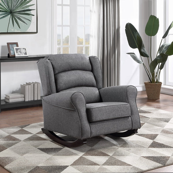 A gray fabric rocking chair in a modern apartment.