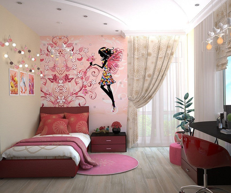 Colorful children’s bedroom with pink bed, fairy wall art, and space-saving decor
