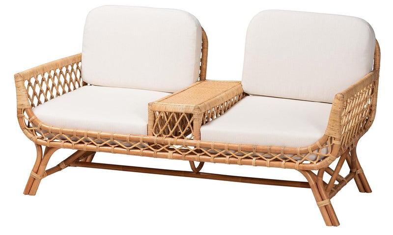 Rattan loveseat with white cushions and built-in center table for outdoor or indoor seating