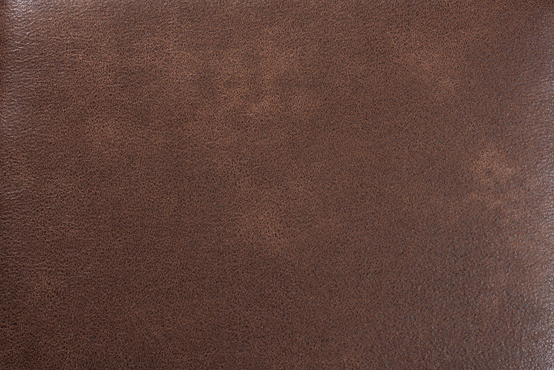 Jonesy Dark Brown Faux Leather Effect Fabric Upholstered Antique Oak Ottoman Baxton