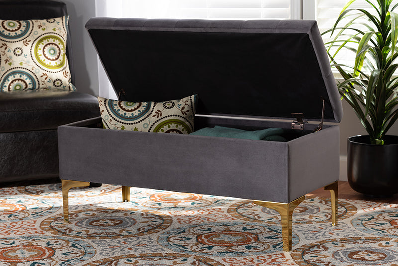 Ayu Glam and Luxe Gray Velvet Fabric Upholstered Gold Finished Button Tufted Storage Ottoman