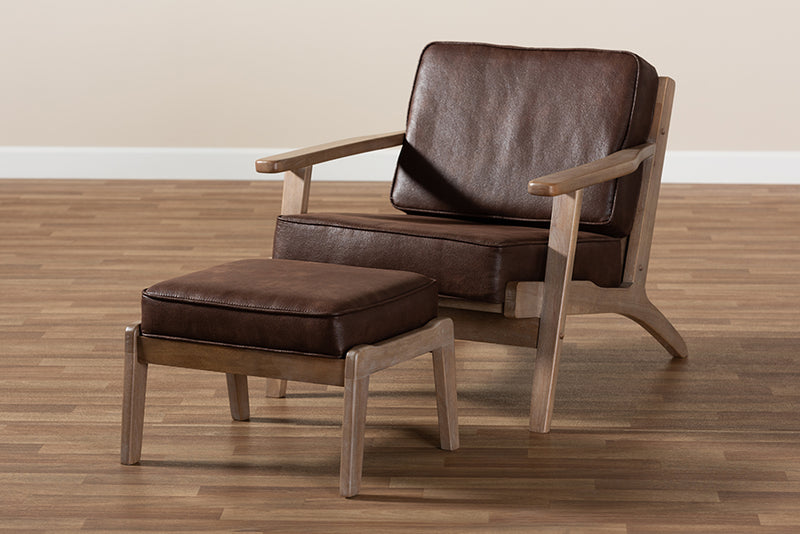 Jonesy Mid-Century Dark Brown Faux Leather Antique Oak Finished 2-Piece Armchair and Ottoman Set