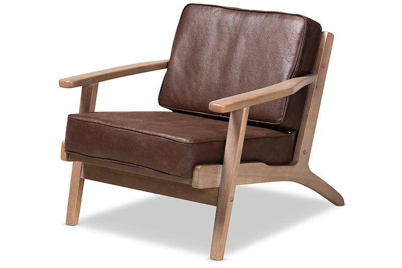 Jonesy Dark Brown Faux Leather Antique Oak Finished 2Pc Armchair and Ottoman Set Baxton