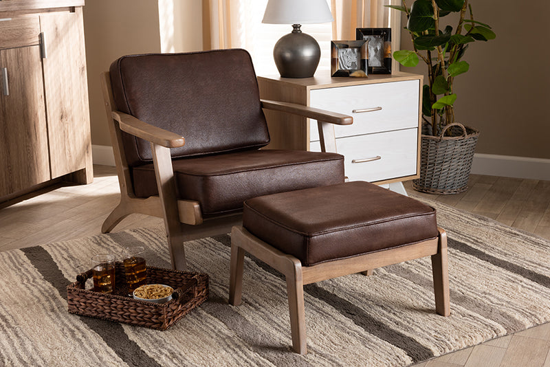 Jonesy Mid-Century Dark Brown Faux Leather Antique Oak Finished 2-Piece Armchair and Ottoman Set