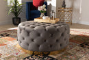 Arielle Gray Velvet Fabric Upholstered Gold Finished Round Cocktail Ottoman Baxton