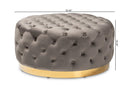 Arielle Gray Velvet Fabric Upholstered Gold Finished Round Cocktail Ottoman Baxton