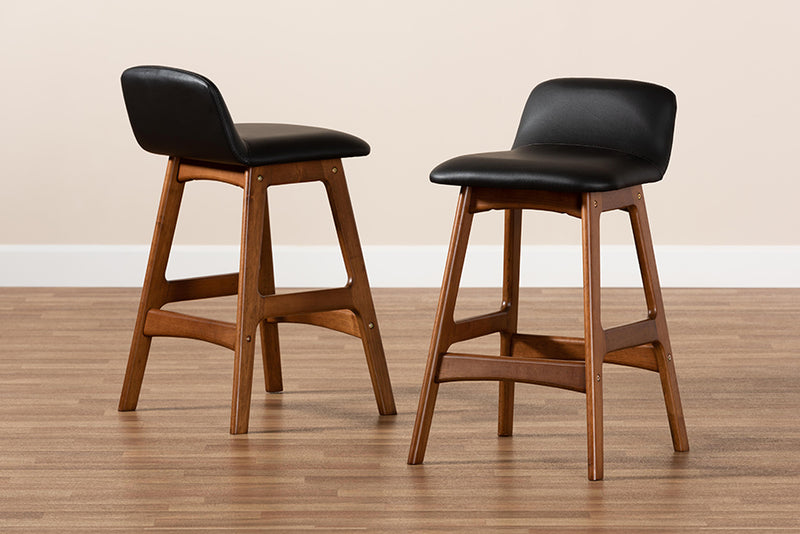 Ontario Mid-Century Modern Black Faux Leather Upholstered and Walnut Brown Finished Wood 2-Piece Counter Stool Set