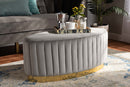 Psinta Gray Velvet Fabric Upholstered and Gold PU Leather Ottoman Baxton