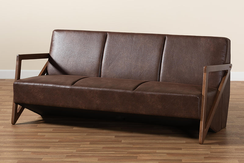 Holitz Mid-Century Dark Brown Faux Leather Effect Fabric Upholstered and Walnut Brown Finished Wood Sofa