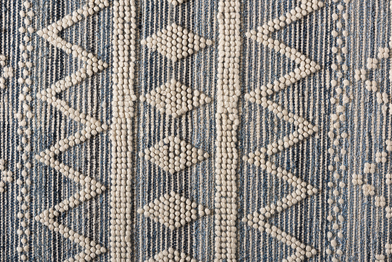 Lauro Modern and Contemporary Ivory and Blue Handwoven Wool Blend Area Rug