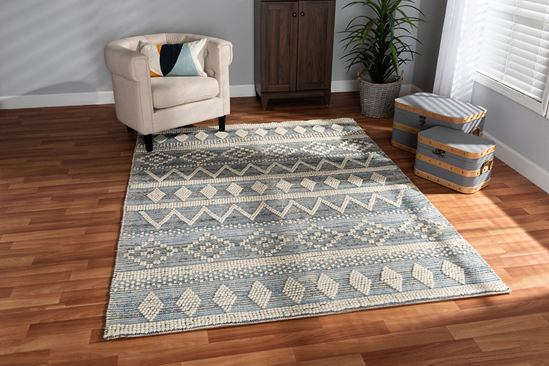 Lauro Modern and Contemporary Ivory and Blue Handwoven Wool Blend Area Rug