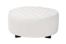 Paiva Ivory Boucle Upholstered and Black Round Ottoman Baxton