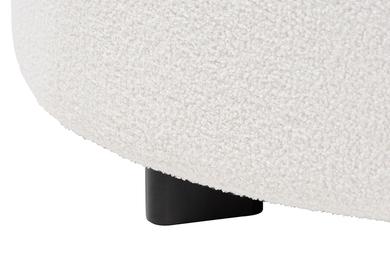 Paiva Modern and Contemporary Ivory Boucle Upholstered and Black Finished Wood Round Ottoman