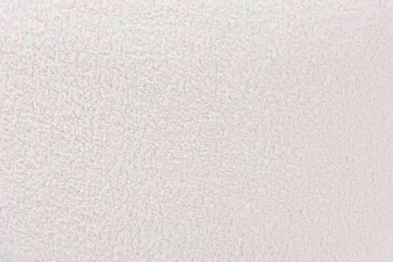 Paiva Ivory Boucle Upholstered and Black Round Ottoman Baxton