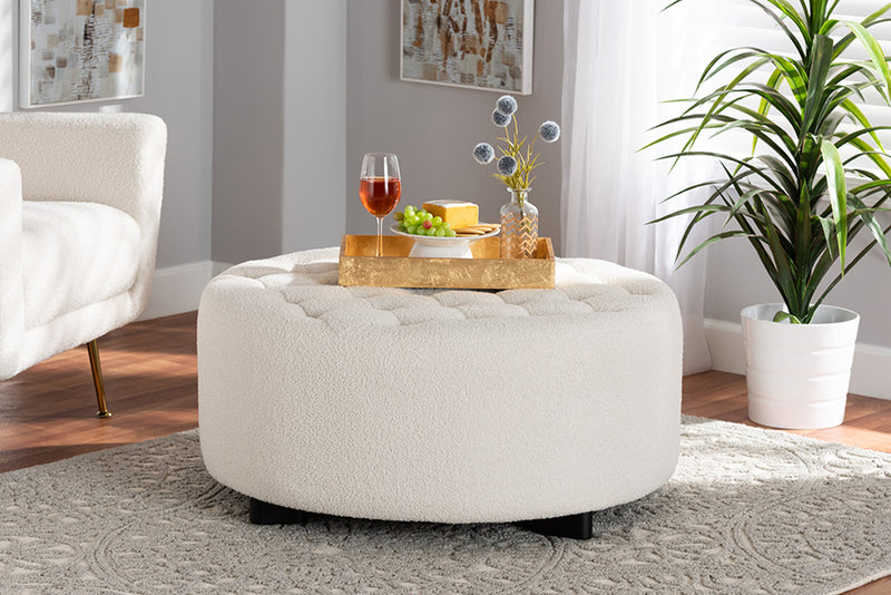 Paiva Modern and Contemporary Ivory Boucle Upholstered and Black Finished Wood Round Ottoman