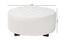 Paiva Ivory Boucle Upholstered and Black Round Ottoman Baxton