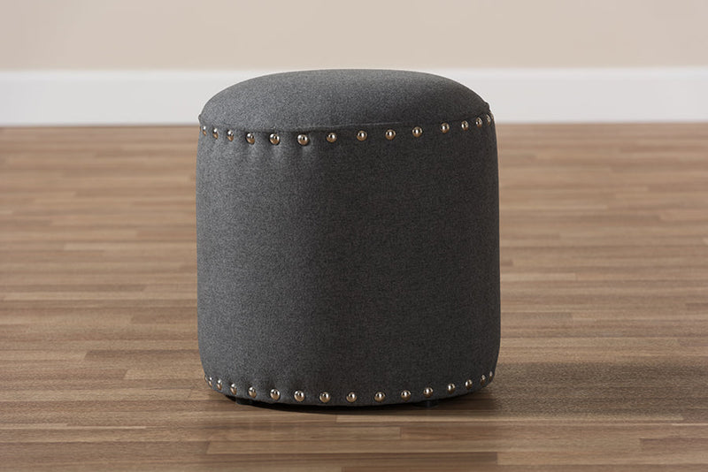 Augusta Dark Gray Fabric Upholstered Nail Trim Ottoman Baxton