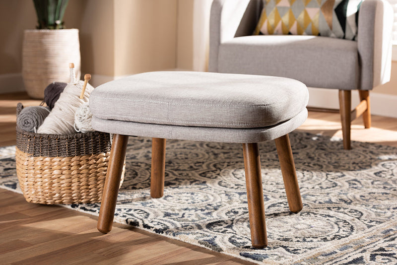 Quintus Greyish Beige Fabric Upholstered Walnut Brown Ottoman Baxton