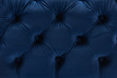 Gates Royal Blue Velvet Fabric Upholstered Gold Finished Button Tufted Ottoman Baxton