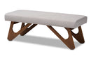 Soleil Greyish Beige Fabric Upholstered Walnut Brown Finished Boomerang Bench Baxton