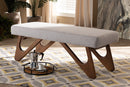 Soleil Greyish Beige Fabric Upholstered Walnut Brown Finished Boomerang Bench Baxton