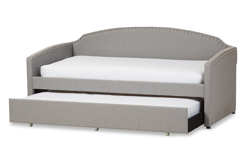 Aubrianne Modern and Contemporary Gray Fabric Nail Heads Trimmed Arched Back Sofa Twin Daybed w/Roll-Out Trundle Guest Bed