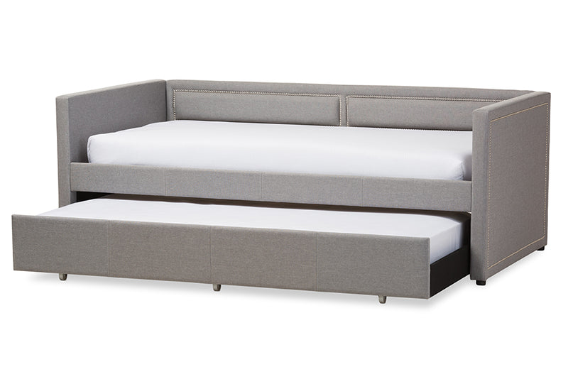 Tiana Modern and Contemporary Gray Fabric Nail Heads Trimmed Sofa Twin Daybed w/Roll-Out Trundle Guest Bed