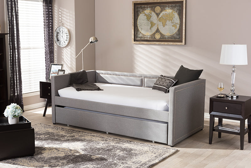 Tiana Modern and Contemporary Gray Fabric Nail Heads Trimmed Sofa Twin Daybed w/Roll-Out Trundle Guest Bed