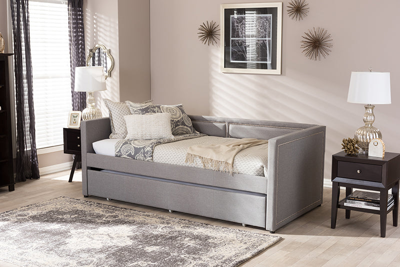 Tiana Modern and Contemporary Gray Fabric Nail Heads Trimmed Sofa Twin Daybed w/Roll-Out Trundle Guest Bed