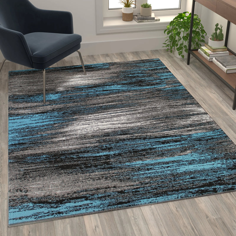 Angie Collection 5' x 7' Blue Scraped Design Area Rug - Olefin Rug with Jute Backing iHome Studio