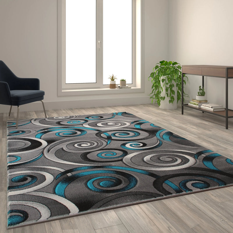 Angie Collection 6' x 9' Turquoise Swirl Olefin Area Rug with Jute Backing iHome Studio