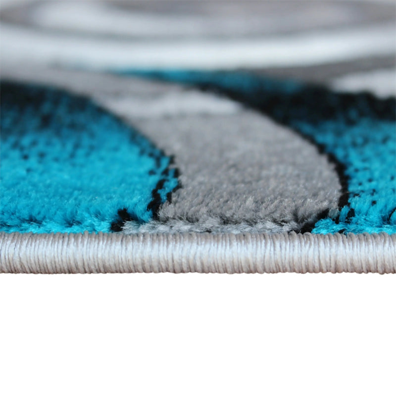 Angie Collection 6' x 9' Turquoise Swirl Olefin Area Rug with Jute Backing iHome Studio