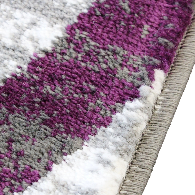 Clifton Collection 4' x 5' Purple Swirl Patterned Olefin Area Rug with Jute Backing iHome Studio