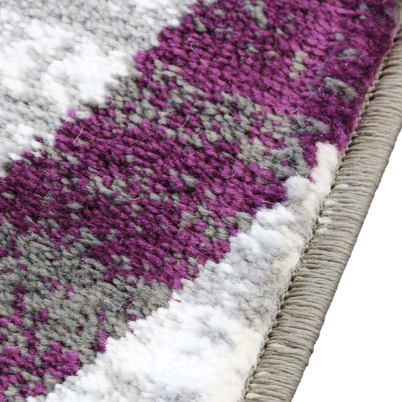 Clifton Collection 6' x 9' Purple Swirl Patterned Olefin Area Rug with Jute Backing iHome Studio