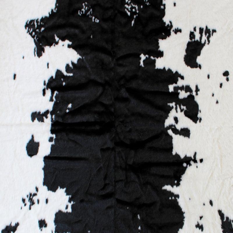 Naomi Collection 5' x 7' Black Faux Cowhide Print Area Rug with Polyester Backing iHome Studio